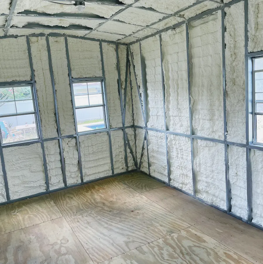Closed-cell spray foam insulation applied to wall cavities in a residential project in Frankfort
